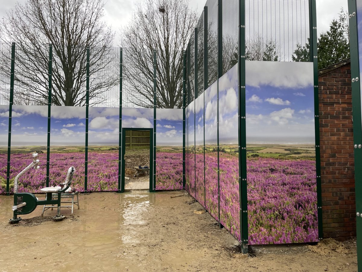 Multi-use games area with rebound fencing